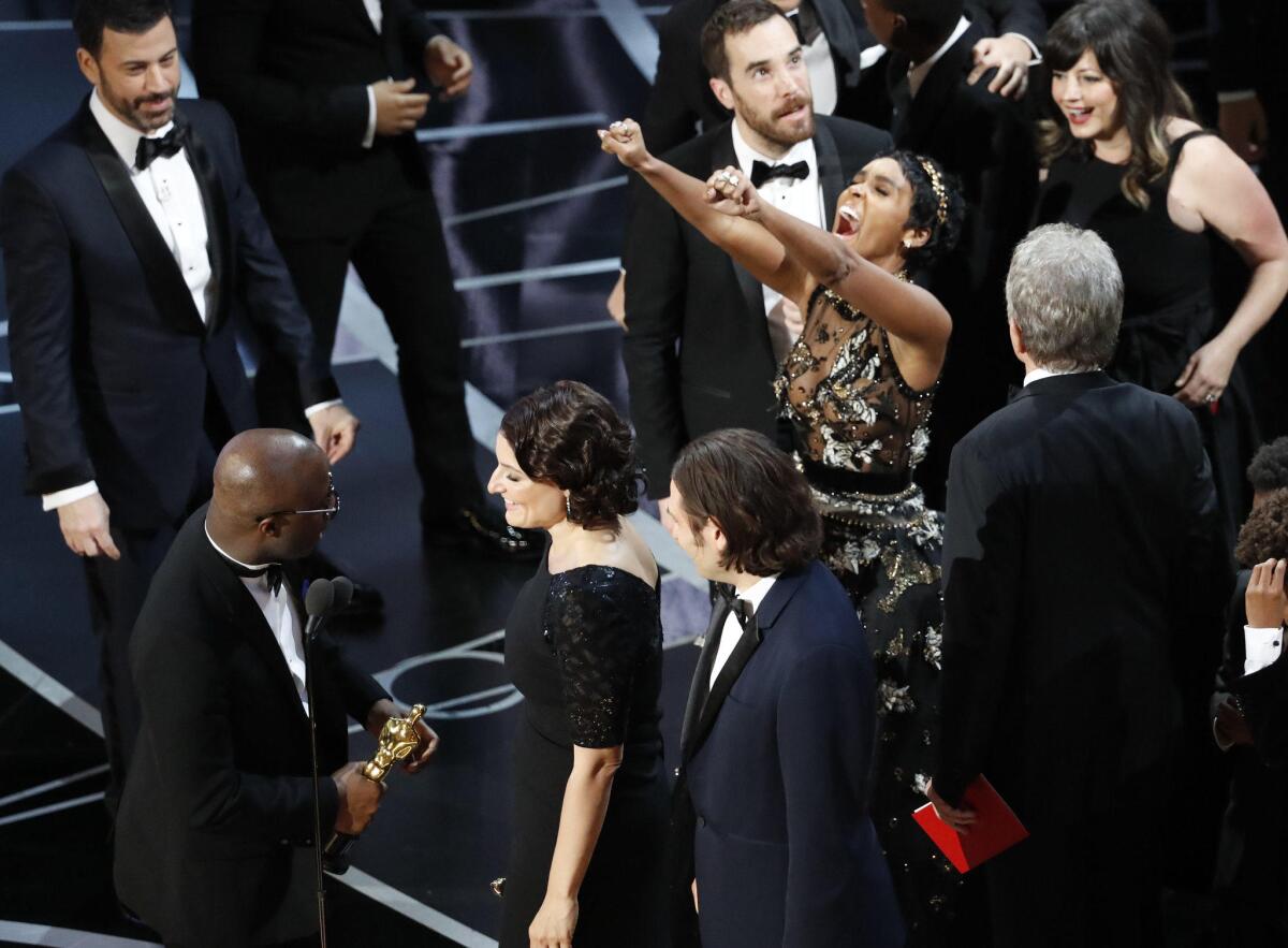 Janelle Monae, center, celebrates after coming onstage once the best picture mix-up was announced.