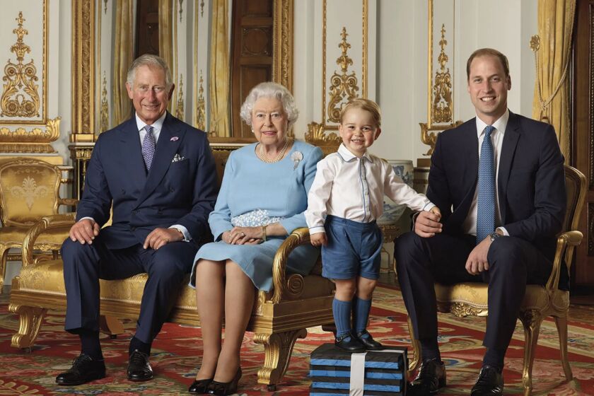In this file handout photo provided by Buckingham Palace and released in 2016, Queen Elizabeth, Prince Charles, Prince William and Prince George pose for a photo to mark the Queen's 90th birthday, in the White Drawing Room at Buckingham Palace, London. (Ranald Mackechnie/Buckingham Palace via AP)