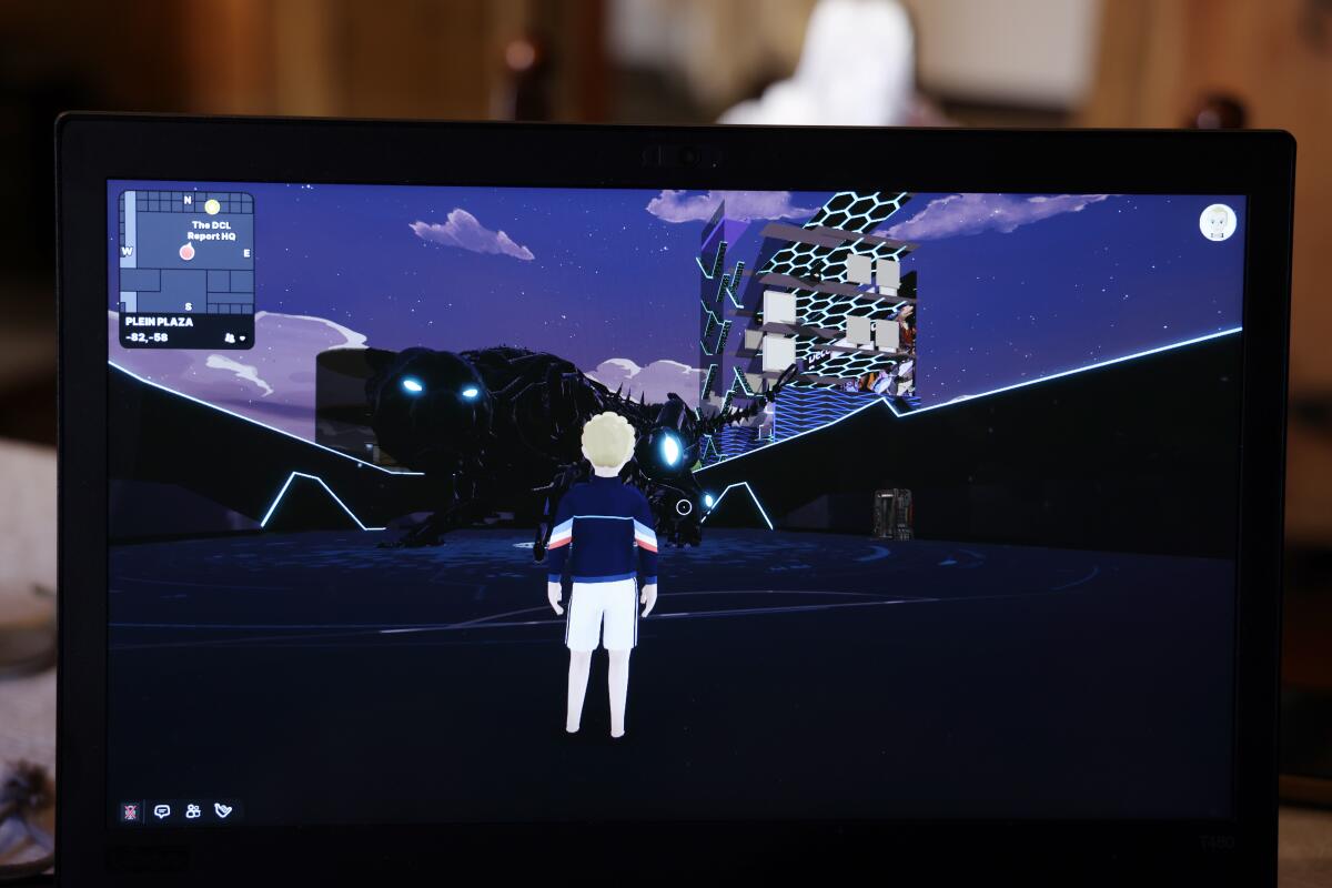 A computer screen shows a virtual person in a virtual world