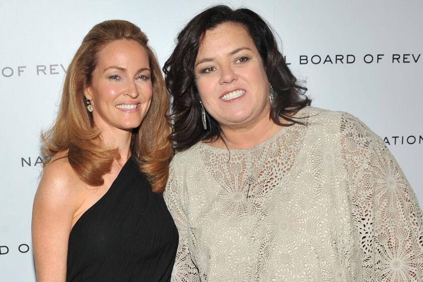 Rosie O'Donnell and her wife of two years, Michelle Rounds, left.