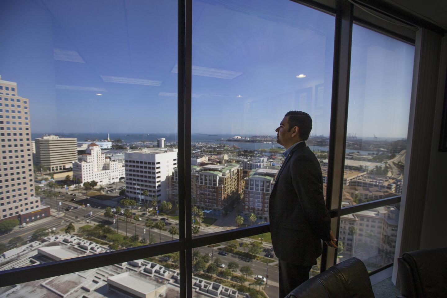 Long Beach Mayor Robert Garcia looks out over the city from his City Hall office.