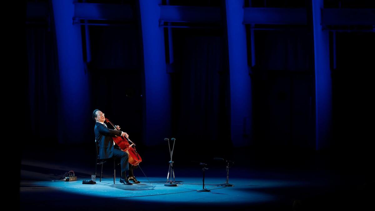 Yo-Yo Ma plays the six Bach cello suites as a single performer for nearly three hours at the Hollywood Bowl.