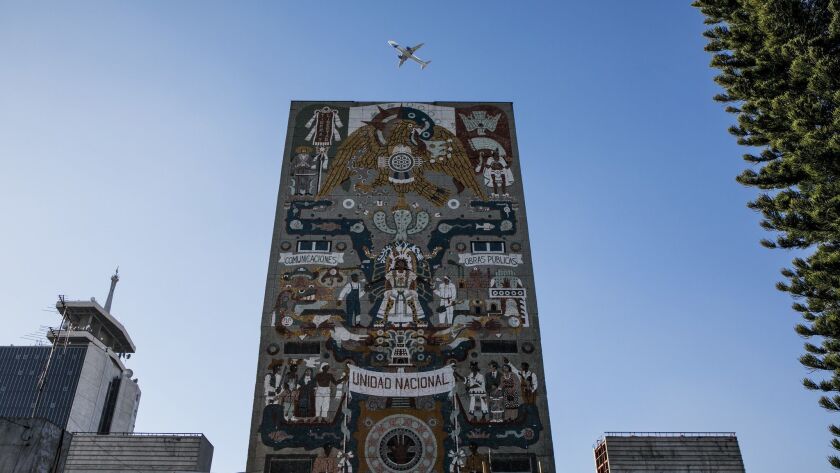 Juan O'Gorman's "Song to the Homeland" mural covers the earthquake-damaged Centro SCOP in Mexico City.