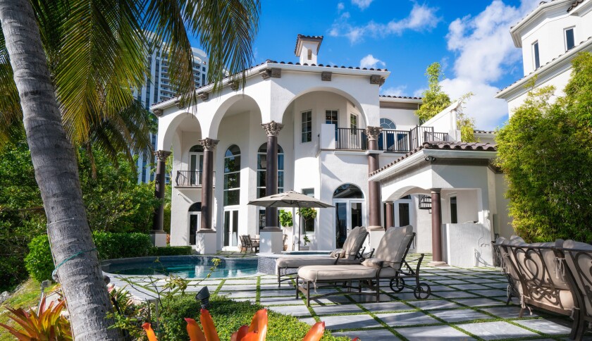 DJ Khaled's Miami home, which he decked out with a gold chandelier and a custom sneaker closet, is on the market for $8 million.