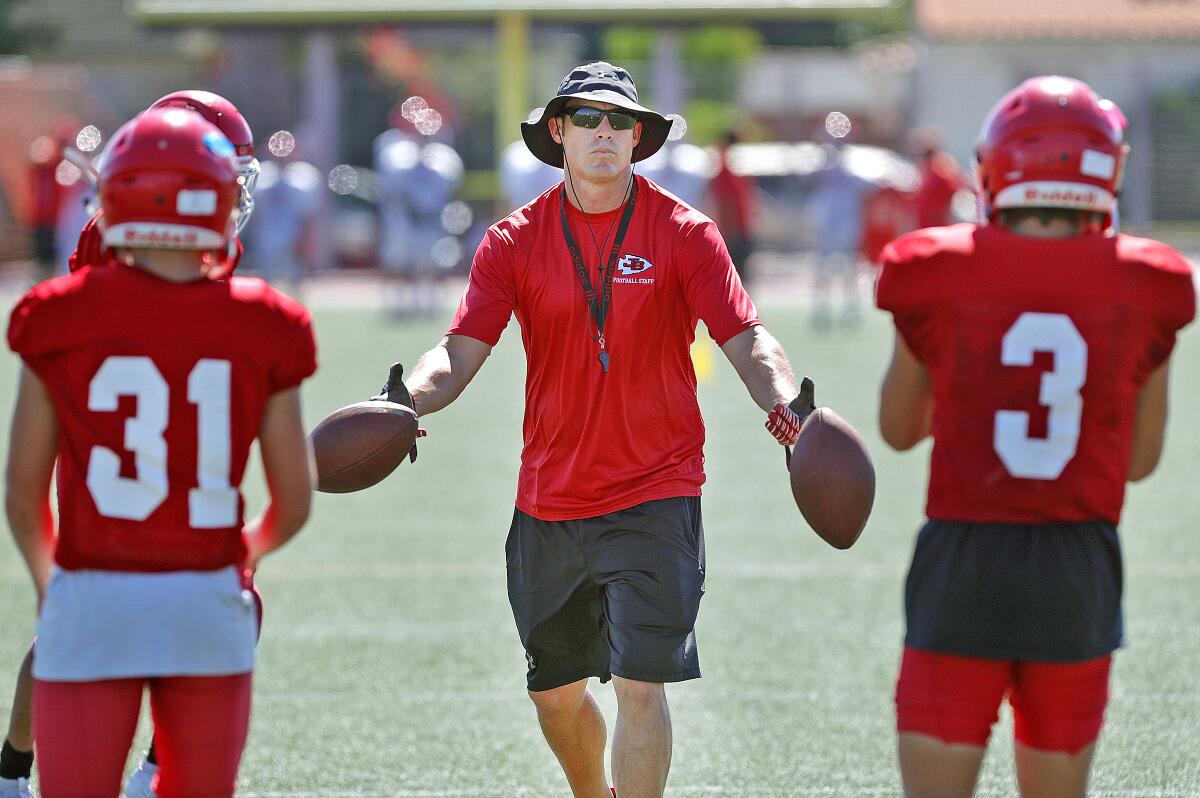 Burroughs High football coach Rand Holdren has stepped down after leading the Indians' program the last two seasons.