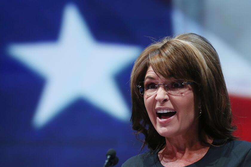 Former Alaska Gov. Sarah Palin, shown in 2013, thinks the "Politically Correct Police" are going to bust Mike Ditka for speaking his mind about the Redskins' name.