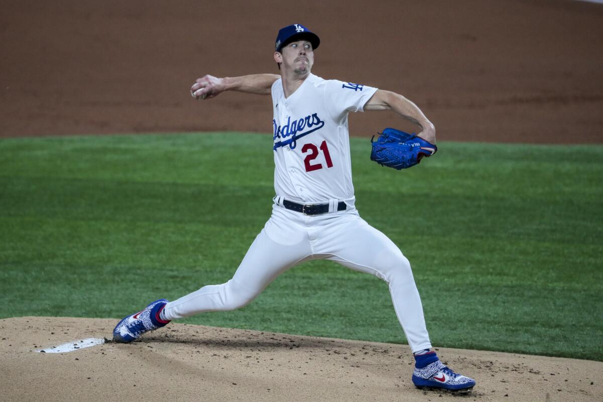 Dodgers starting pitcher Walker Buehler delivers against the San Diego Padres.