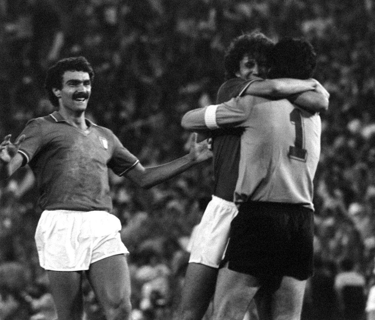 Giuseppe Bergomi, left, rushes toward teammates Fulvio Collovati and Dino Zoff after Italy defeated West Germany in the 1982 World Cup final.