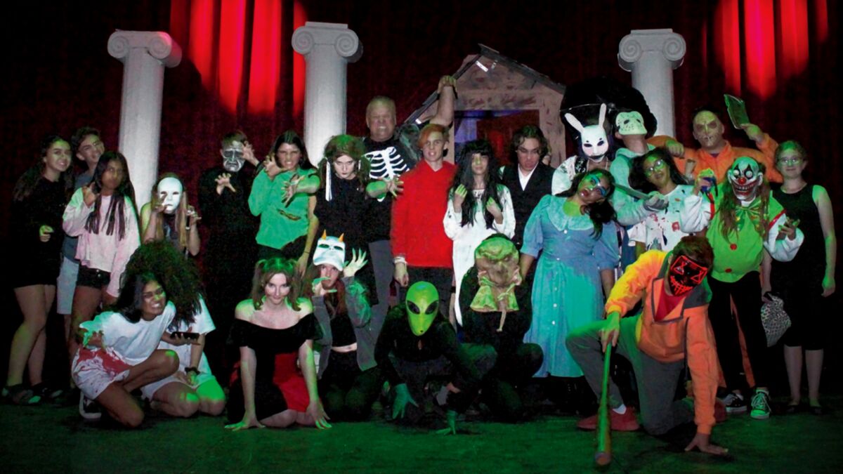 ABSOLUTELY HORRIFYING! La Jolla High School's Theater Arts Department, under the direction of teacher Stacy Allen (standing, center back), presented a Haunted House in the auditorium on 2019 Halloween night. Theater students made the stage a frightening experience for trick-or-treaters looking for something spooky in the neighborhood. — Pearl Preis