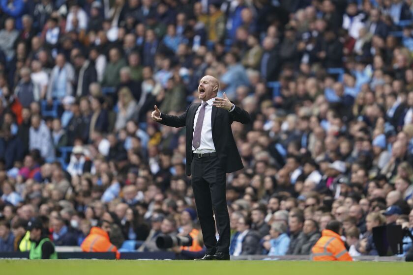 FILE - Burnley's manager Sean Dyche gives instructions from the side line during the English Premier League soccer match between Manchester City and Burnley at Etihad stadium in Manchester, England, on Oct. 16, 2021. Everton has turned to Sean Dyche in its fight to secure Premier League survival. The former Burnley manager was hired by Everton as the successor to Frank Lampard on Monday Jan. 30, 2023 and has signed a two-and-a-half-year contract. (AP Photo/Jon Super, File)