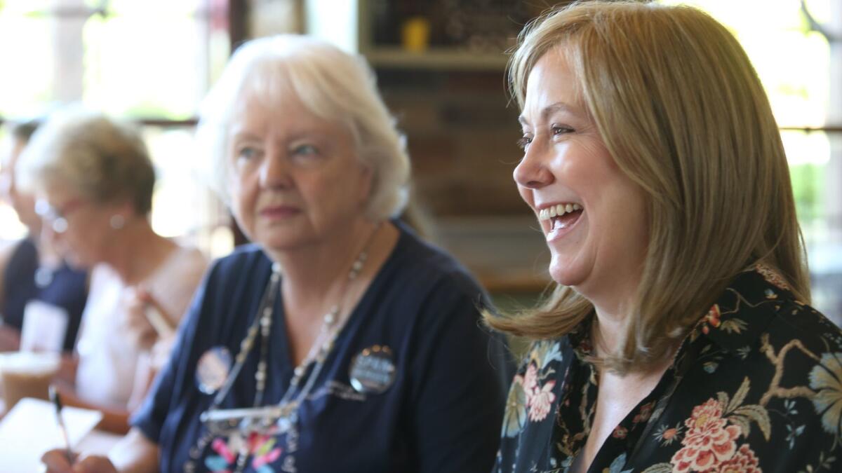 Kim Drew Wright, foreground, founded the Liberal Women of Chesterfield County immediately after President Trump was elected in 2016.