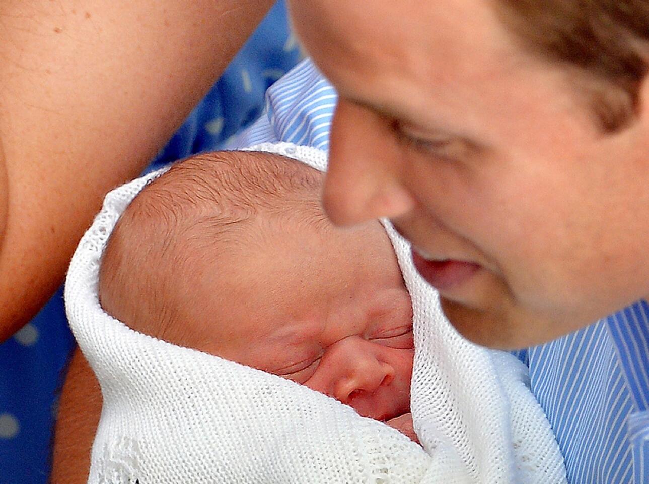The newborn Prince of Cambridge leaves St Mary's Hospital with his parents the Prince William, Duke of Cambridge and Catherine, Duchess of Cambridge.