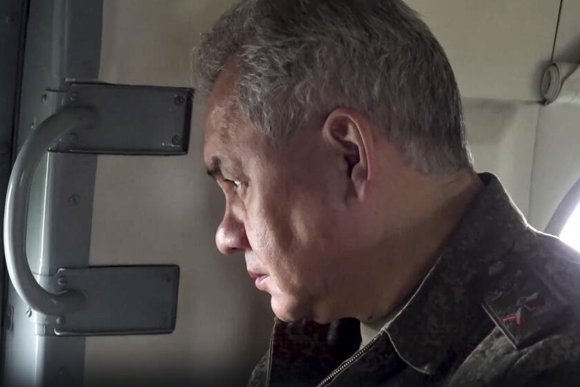 In this photo taken from video released on Monday, June 26, 2023 by Russian Defense Ministry Press Service, Russian Defense Minister Sergei Shoigu is on board of a military helicopter on his way to inspect a command post of one of the formations of the Zapad (West) group of Russian troops at an undisclosed location of Ukraine. Shoigu made his first public appearance Monday since a mercenary uprising demanded his ouster, inspecting troops in Ukraine. (Russian Defense Ministry Press Service via AP)