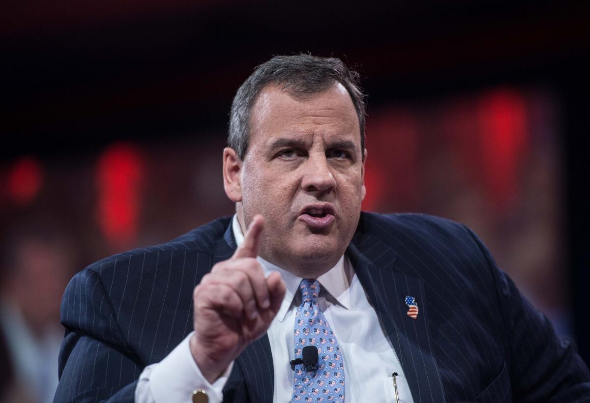 (FILES) In this February 26, 2015 file photo, New Jersey Governor and Republican presidential candidate Chris Christie addresses the annual Conservative Political Action Conference (CPAC) at National Harbor, Maryland. Christie on August 30, 2015 defended his controversial proposal to keep tabs on immigrants electronically the way FedEx tracks packages. In an interview with Fox News Sunday, Christie denied he was suggesting "people are packages. Don't be ridiculous." "Let's use the same type of technology to make sure that 40% of the 11 million people here illegally don't overstay," he said. Immigration has emerged as a dominant issue in the Republican race since billionaire and frontrunner Donald Trump launched his campaign in June with incendiary accusations that Mexican immigrants were drug traffickers and rapists. AFP PHOTO/NICHOLAS KAMM/FILESNICHOLAS KAMM/AFP/Getty Images ** OUTS - ELSENT, FPG - OUTS * NM, PH, VA if sourced by CT, LA or MoD **