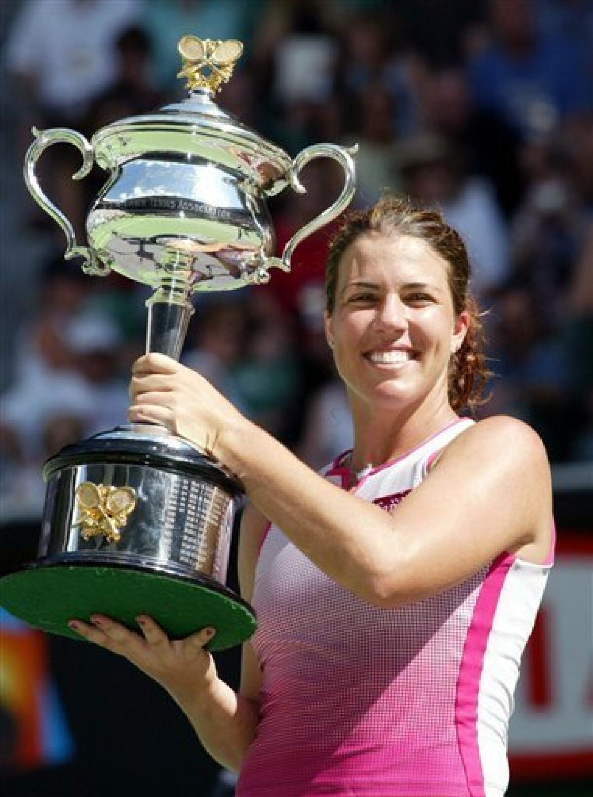 FILE - This Jan. 26, 2002 file photo shows Jennifer Capriati holding her trophy after defeating Martina Hingis in the women's singles final at the Australian Open tennis tournament in Melbourne, Australia. Capriati has been elected to the International Tennis Hall of Fame after an up-and-down career that saw her go from teen prodigy status to off-court troubles to Grand Slam champion. (AP Photo/Rick Stevens, File)
