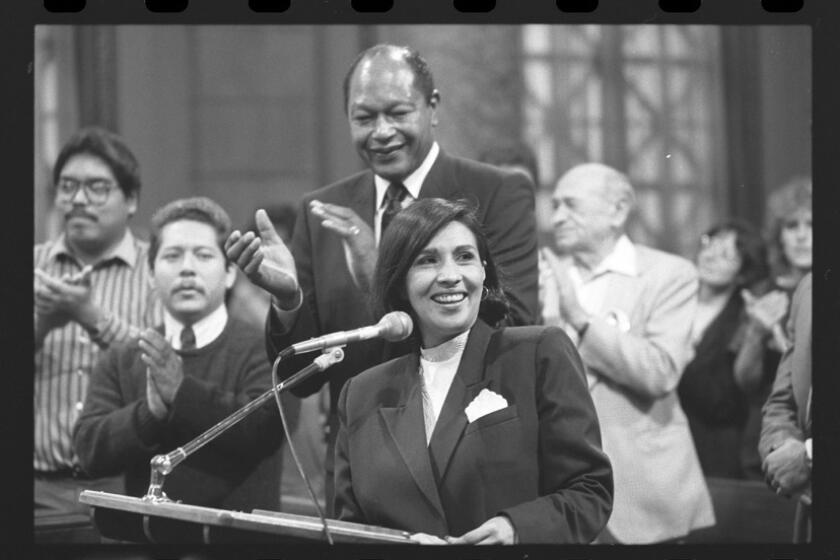 Mayor Tom Bradley and Councilwoman-elect Gloria Molina, Los Angeles, Calif., Feb. 12, 1987