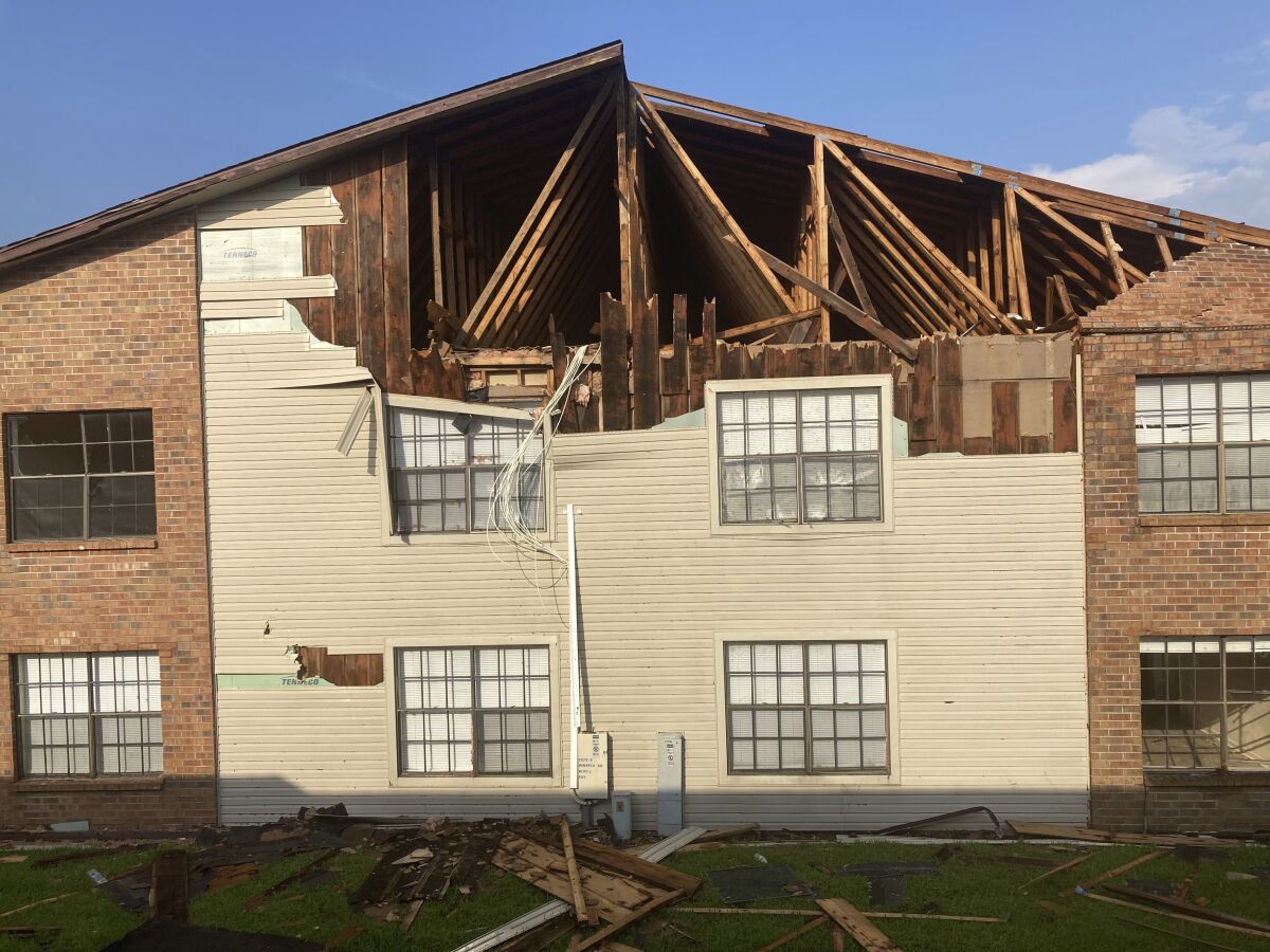 An apartment building in Houma, La., that was damaged by Hurricane Ida is seen, Sunday, Sept. 5, 2021. The storm caused such extensive damage to the buildings in the complex that residents have to move out. (AP Photo/Rebecca Santana)
