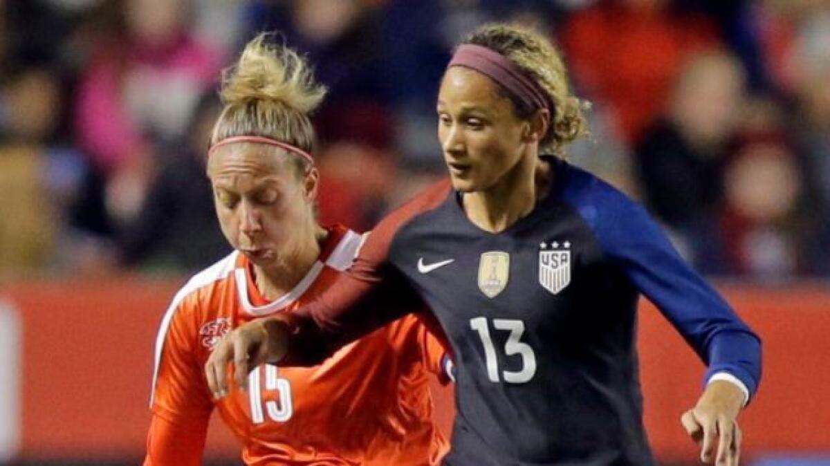 Fresno product Lynn Williams, right, is shown in action against Switzerland's Caroline Abbe during a friendly match on Oct. 19, 2016.