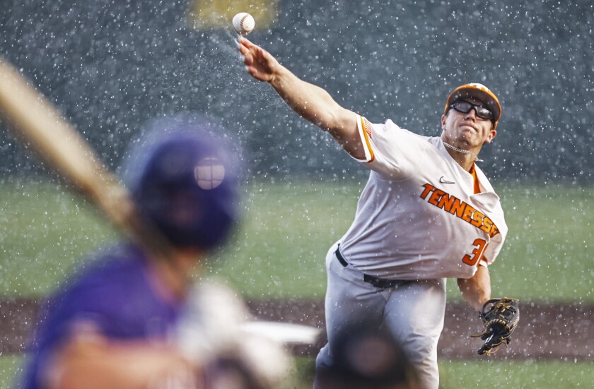 Tennessee pitcher Chad Dallas (36) throws to an LSU batter during an NCAA college baseball super regional game Saturday, June 12, 2021, in Knoxville, Tenn. (AP Photo/Wade Payne)