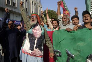 Supporters of Pakistan's Former Prime Minister Imran Khan's party 'Pakistan Tehreek-e-Insaf' chant slogans during a protest against alleged vote-rigging in some constituencies in the parliamentary elections, in Karachi, Pakistan, Sunday, Feb. 11, 2024. (AP Photo/Fareed Khan)