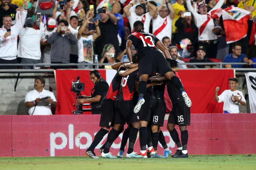 Mandatory Credit: Photo by ADAM S DAVIS/EPA-EFE/REX (10406975m) Peru celebrates after Luis Abram scores in the 85th minute of the second half during a friendly soccer match between Brazil and Peru at the Los Angeles Memorial Coliseum in Los Angeles, California, USA, 10 September 2019. Brazil vs. Peru, Los Angeles, USA - 10 Sep 2019 ** Usable by LA, CT and MoD ONLY **