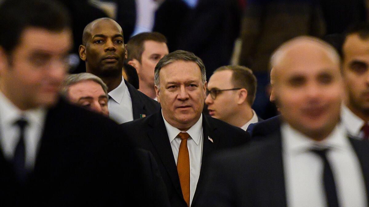 Secretary of State Michael R. Pompeo leaves the Cathedral of the Nativity of Christ in Egypt on Thursday.