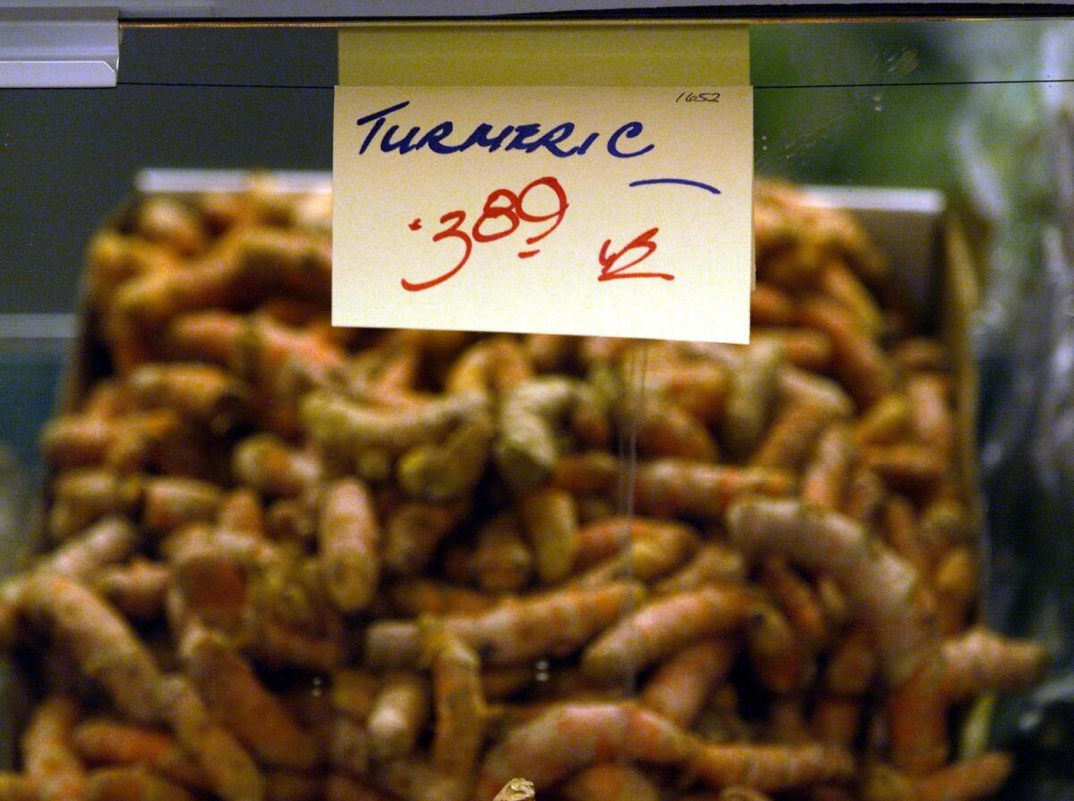 A display of fresh tumeric in the produce section at the Berkeley Bowl market.