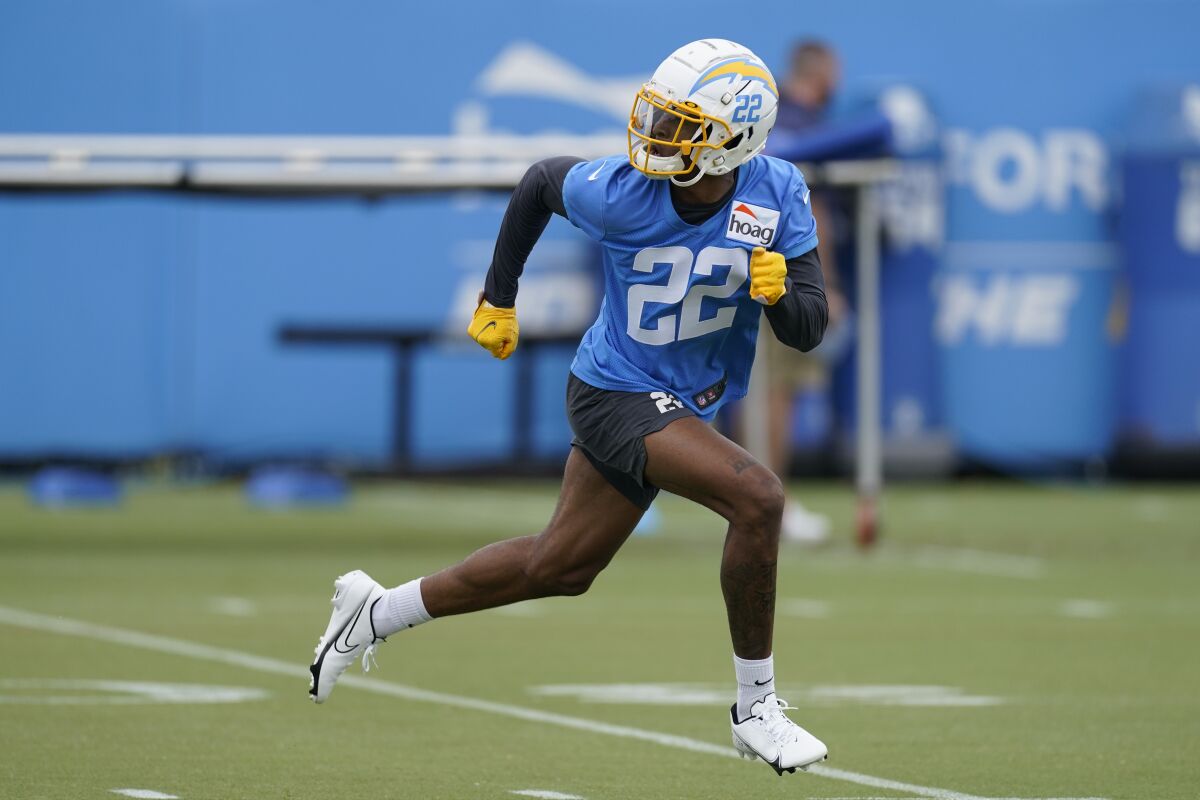 Rookie safety JT Woods participates in drills during a Chargers practice Monday.