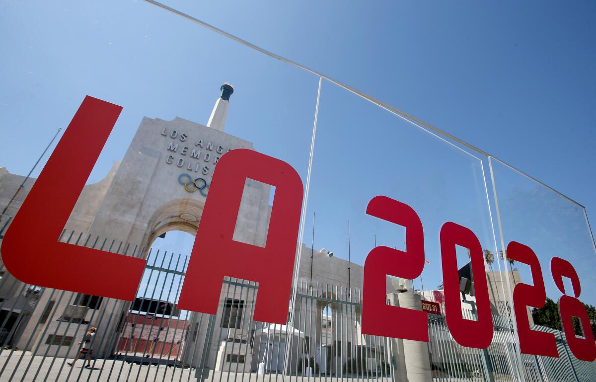 The words L.A. 2028 are displayed outside the Coliseum.