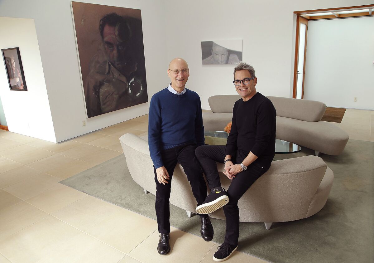 Los Angeles collectors Alan Hergott, left, and Curt Shepard announced a major donation to MOCA. They sit before works by Rudolf Stingel and Luc Tuymans in their Beverly Hills home.