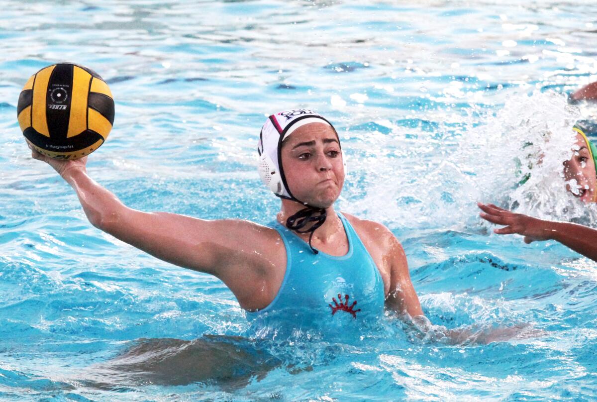 Corona del Mar's Claire Eusey (17) shoots for a goal at Schurr High.  