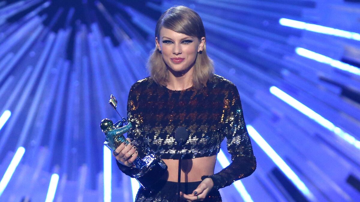 Taylor Swift accepts the award for female video of the year for "Blank Space" at the 2015 MTV Video Music Awards.