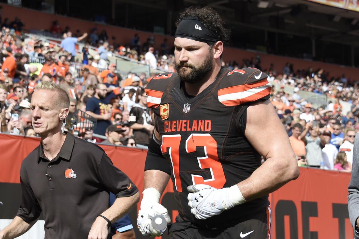 Browns offensive tackle Joe Thomas leaves the field after injuring a triceps on Sunday.