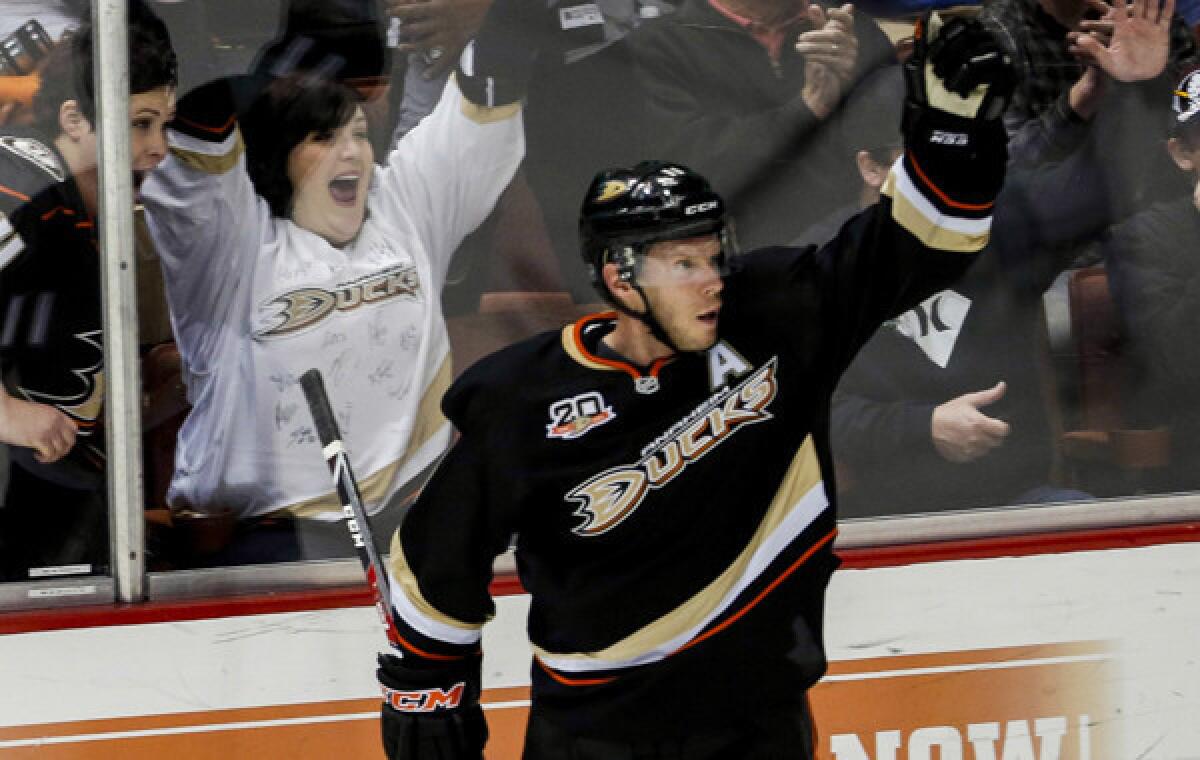 Ducks forward Saku Koivu celebrates after scoring a goal in a win over the Phoenix Coyotes on Dec. 28. Koivu has not made a decision yet on whether this will be his final NHL season.