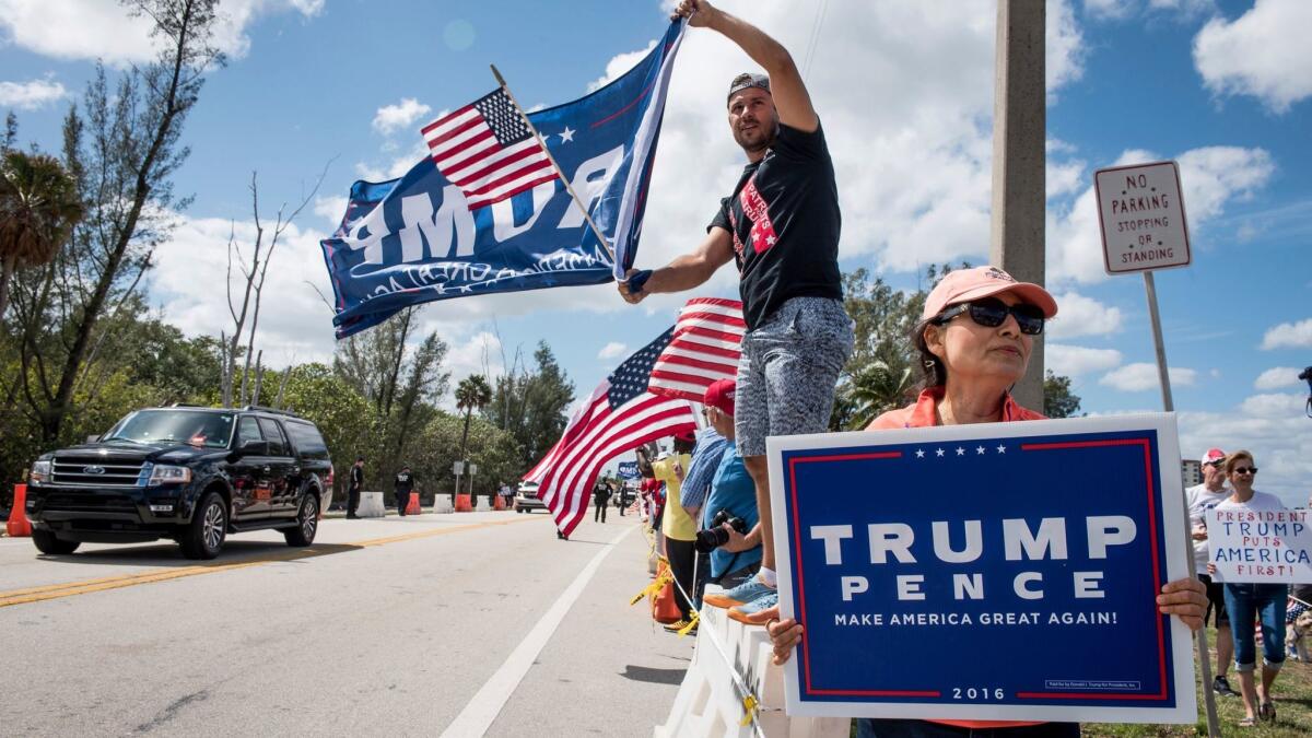 Supporters of President Trump said The Times' recent editorial series showed the newspaper's bias. Above, supporters of the president outside Mar-a-Lago in Florida.