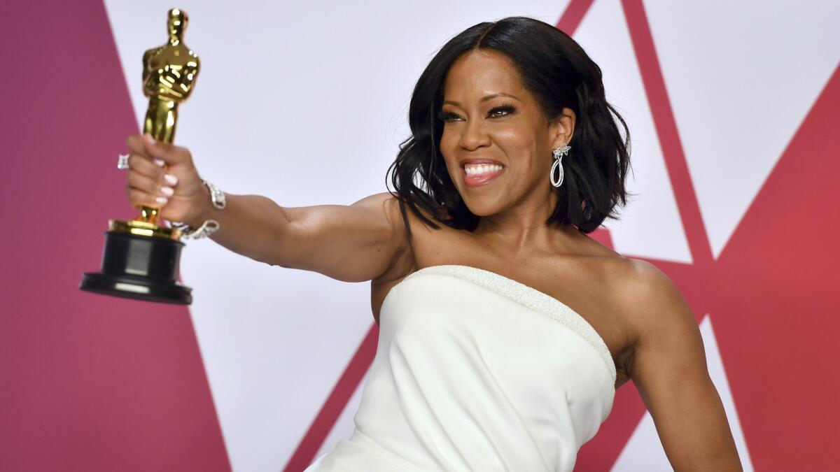 Regina King in the press room with her supporting actress Oscar for "If Beale Street Could Talk."