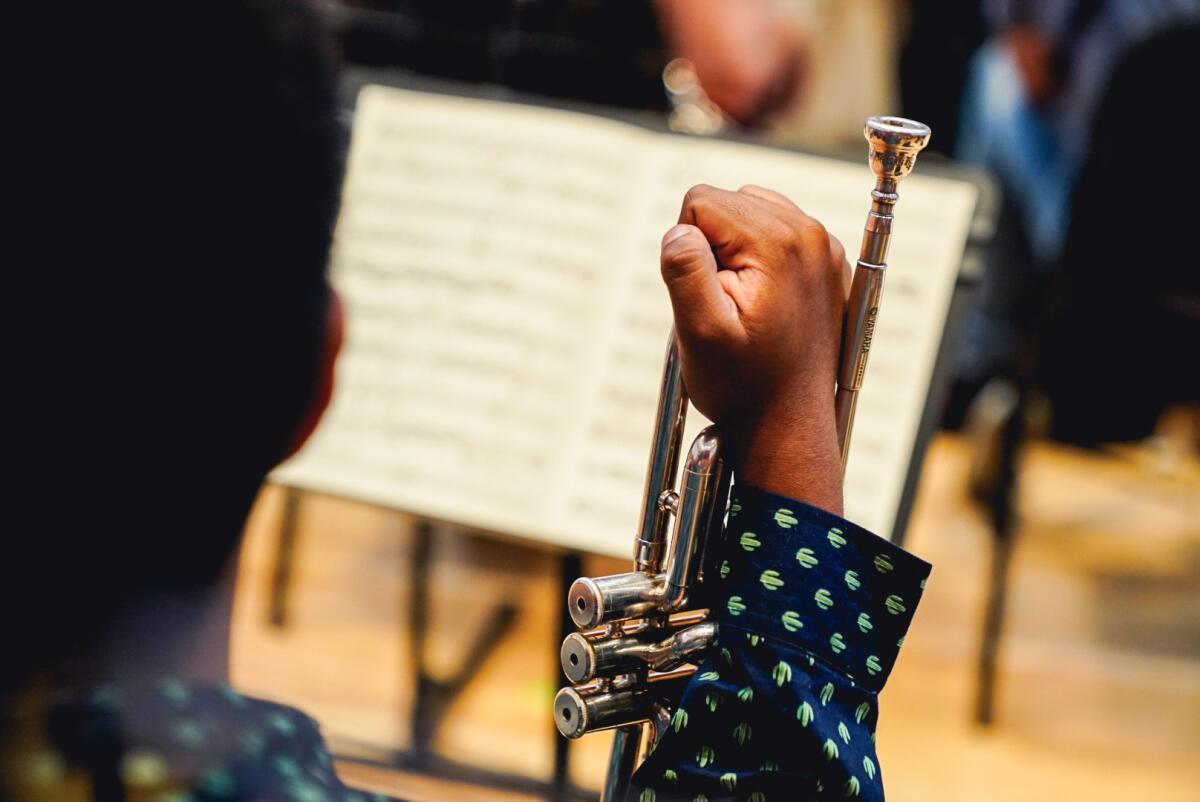 A young musician rests in between practice.