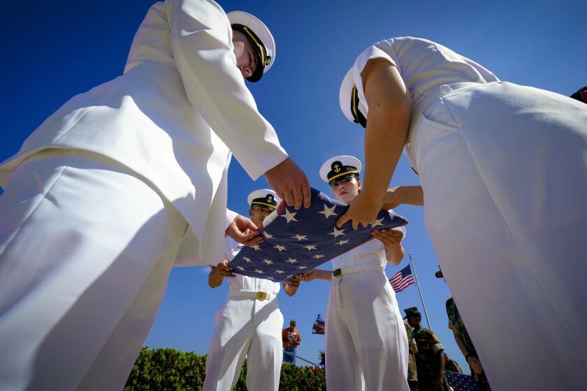 Volunteers made up of active duty sailors, ROTC and Patriot Guard Riders took part in folding 44 U.S. flags at the Miramar National Cemetery on Saturday, Sept. 17, 2022. Each flag represented the 44 Seawolves who were KIA from the Vietnam War.
