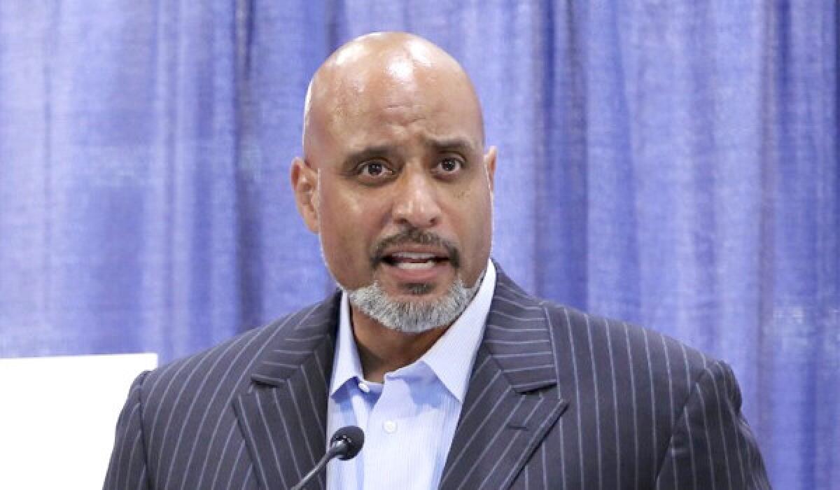 Tony Clark, executive director of the MLB players union, is upset by the delay in the trades involving the Dodgers, Angels, Boston Red Sox and Minnesota Twins.
