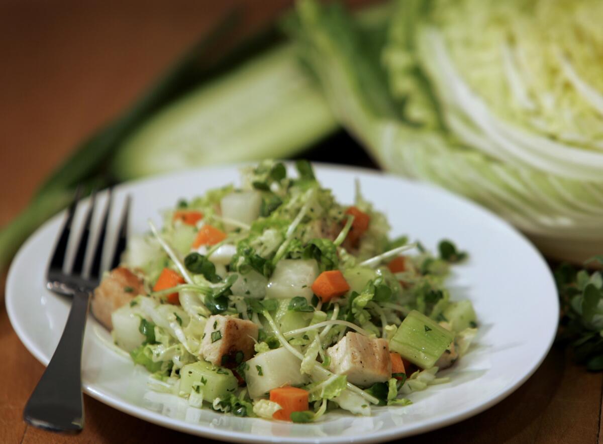 A dish that's both flavorful and low in calories. Recipe: Daikon and grilled chicken chopped salad