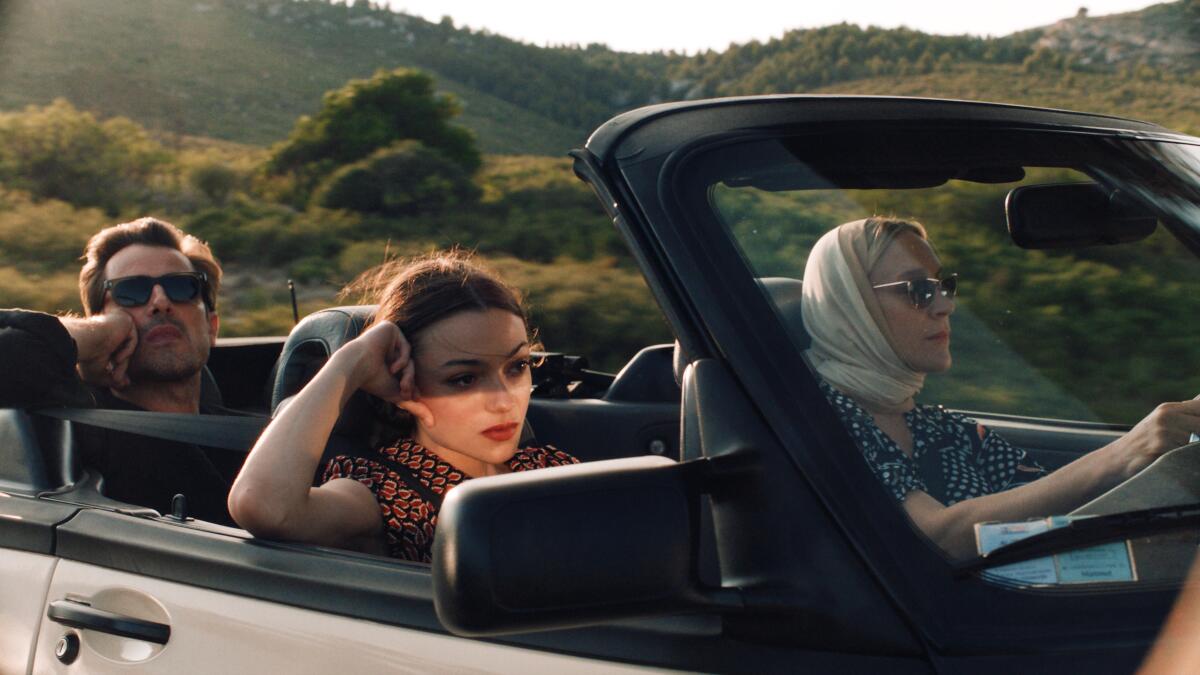 Claes Bang, left, Lily McInerny and Chloë Sevigny in Durga Chew-Bose's adaptation of "Bonjour Tristesse."