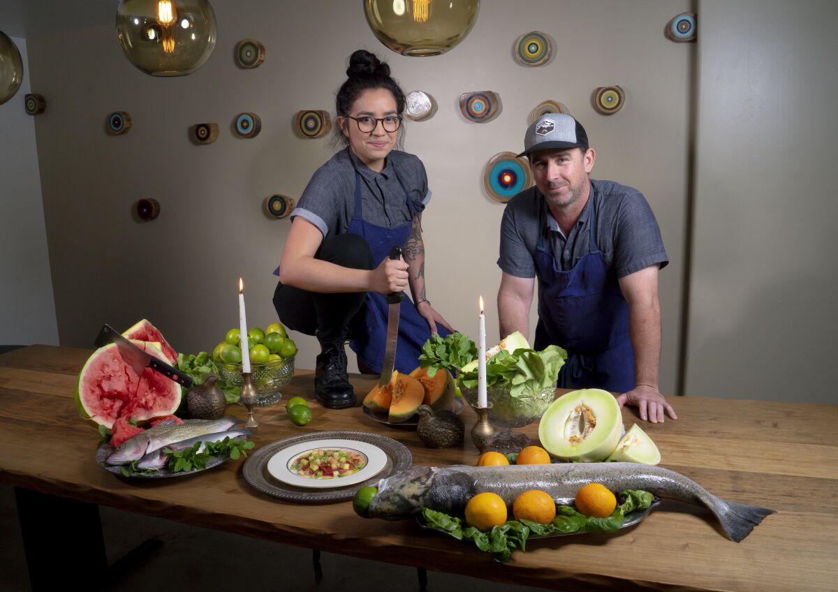 Chef Ryan Johnston (right), culinary director of Whisknladle and chef de cuisine Natallie Avitia.