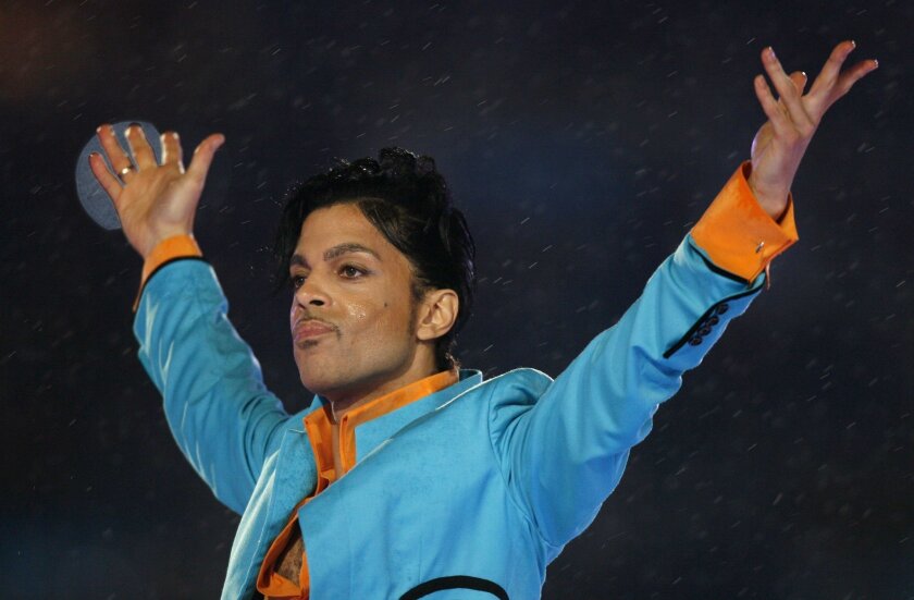 Prince performs during the halftime show of the NFL's Super Bowl XLI football game between the Chicago Bears and the Indianapolis Colts in Miami, Florida, February 4, 2007. Prince has died at the age of 57, according to news reports. REUTERS/Mike Blake/Files ** Usable by SD ONLY **