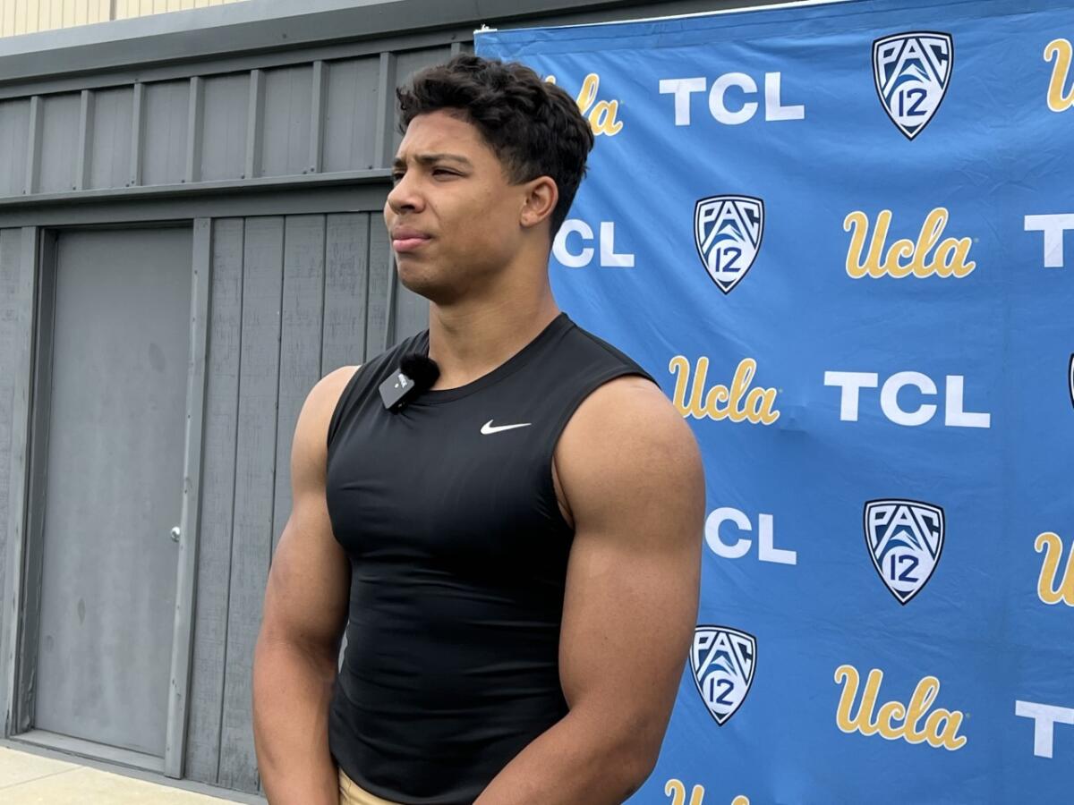 UCLA running back Zach Charbonnet talking at the end of Saturday's spring practice. He's up to 220 pounds.