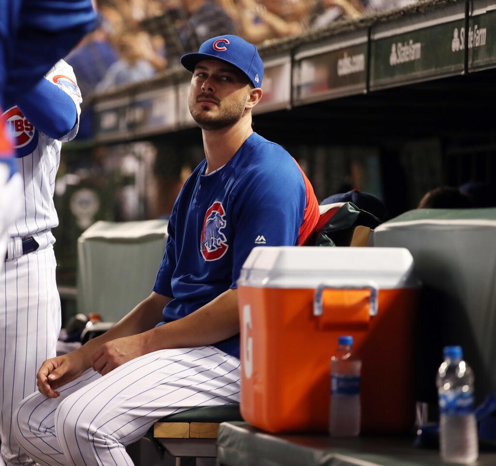 Cubs third baseman Kris Bryant sits on the bench on July 24, 2018, at Wrigley Field.