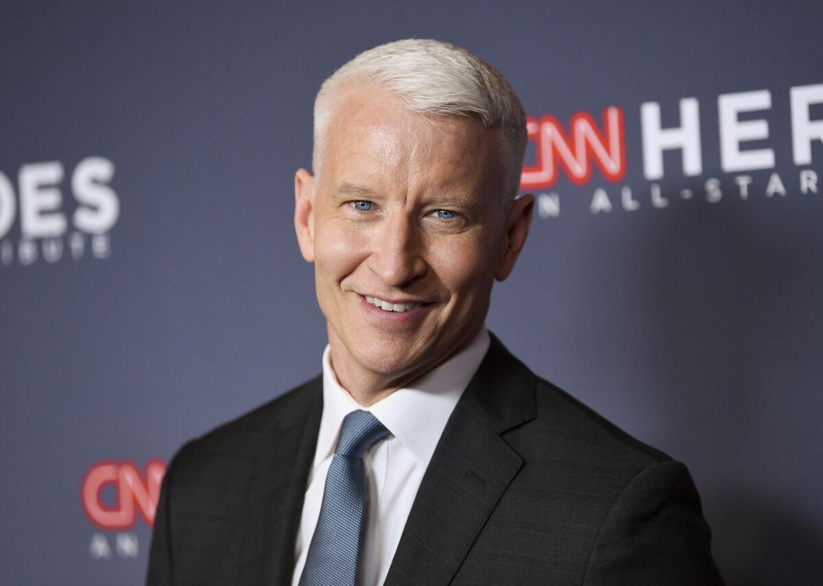 CNN's Anderson Cooper announced the birth of his son on TV.