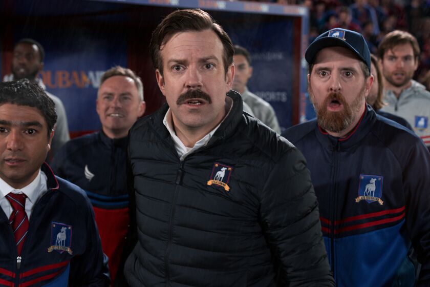 Nick Mohammed, Jason Sudeikis and Brendan Hunt in "Ted Lasso," now streaming on Apple TV+.