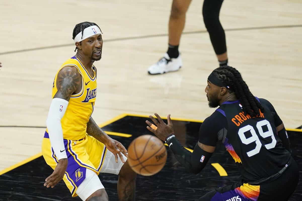 Phoenix Suns player Jae Crowder faces Kentavious Caldwell-Pope of the Lakers.