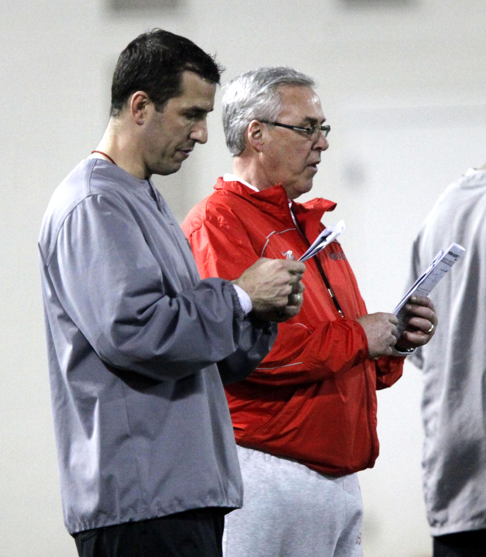Ohio State assistant head coach Luke Fickell, left, and defensive coach Jim Haycock, right, in March 2011.
