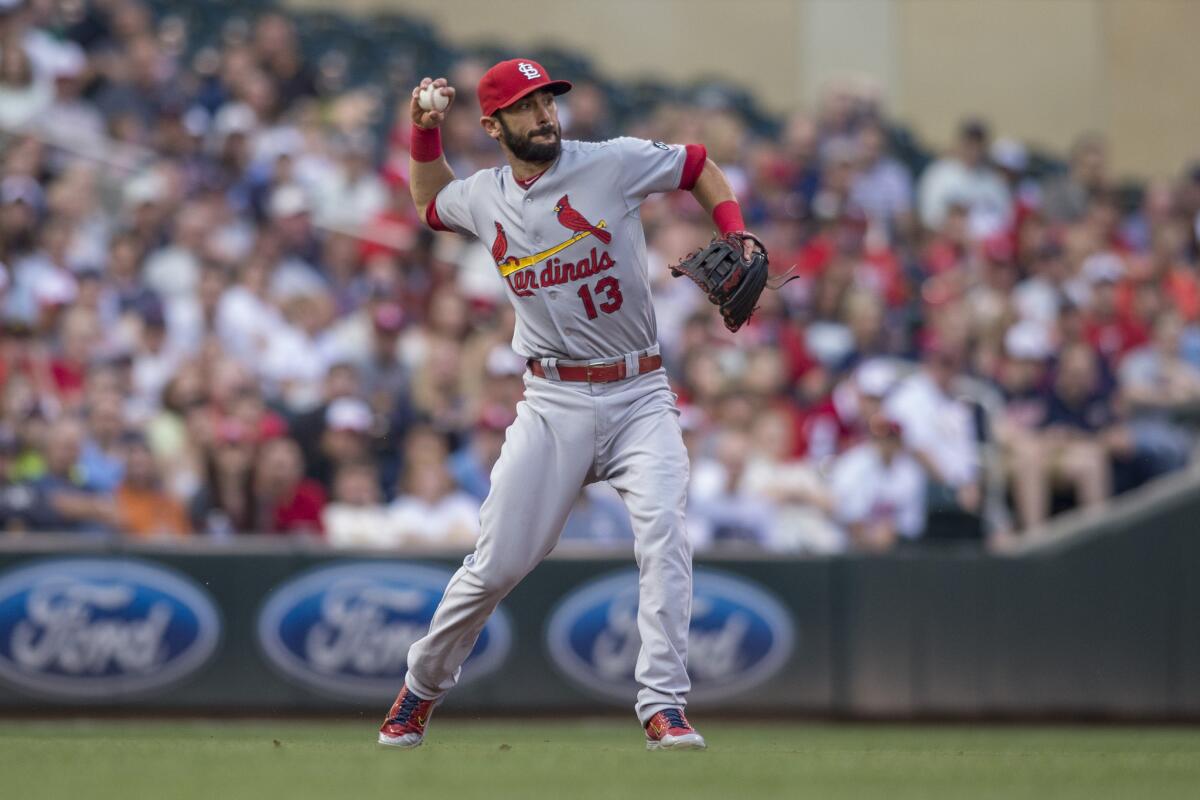 St. Louis Cardinals third baseman Matt Carpenter fields a ball hit by the Minnesota Twins during the third inning of a game on June 17.